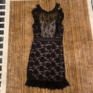 Nightcap Victorian apron mini dress in black. Never worn - stretchy lace dress